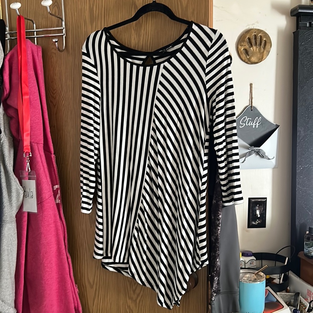 Black and white striped tunic.